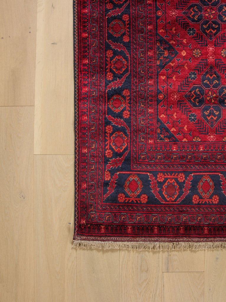 Roya Rugs 5x7 red area rug with dark maroon and midnight blue oriental geometric new tribal Persian wool rug for home and rugs North Carolina Asheville, Raleigh, Marvin, Hickory, Denver NC and Banner Elk rugs.