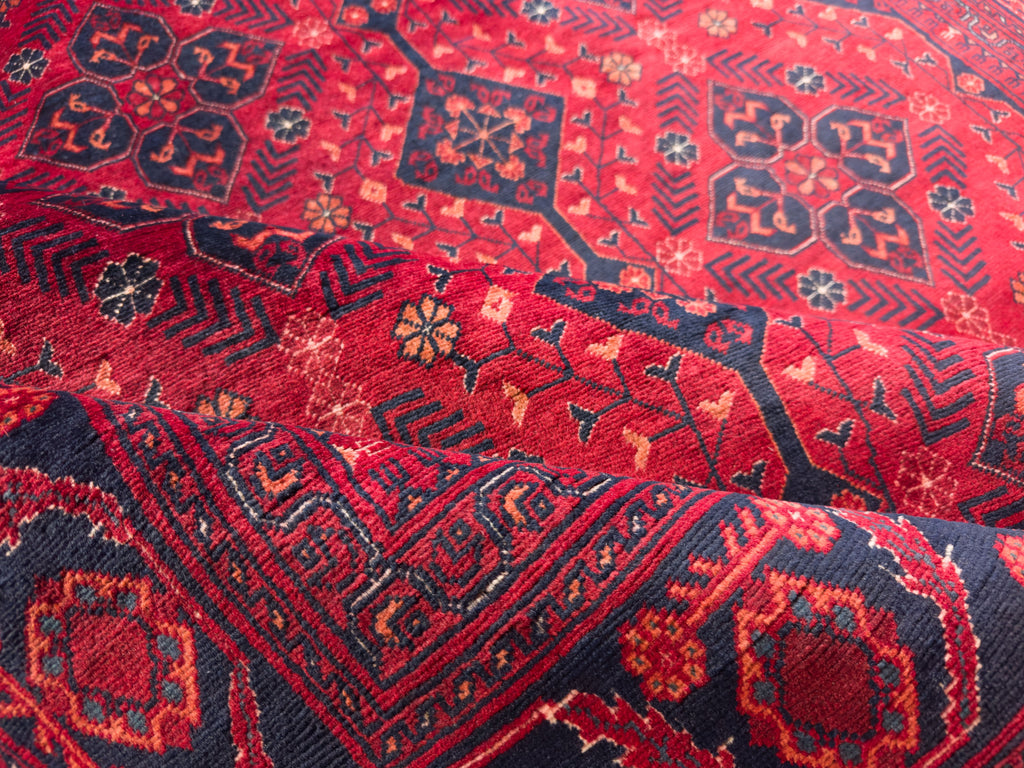 Roya Rugs 5x7 red area rug with dark maroon and midnight blue oriental geometric new tribal Persian wool rug for home and rugs North Carolina Asheville, Raleigh, Marvin, Hickory, Denver NC and Banner Elk rugs.