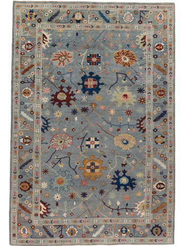 Roya Rugs fine oriental vibrant powder blue and pink floral oushak rug with accent red, navy blue, ivory, orange and celadon green accents. Charlotte nc rugs.