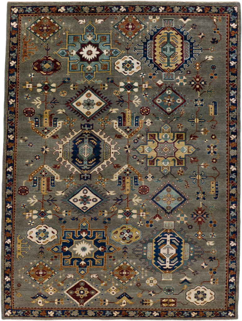 6x9 hand knotted quality oriental southwest tribal wool rug in elephant grey and ivory with deep wine red, teal accent, green, navy blue, gold and ivory colors with geometric design. Roya Rugs Asheville North Carolina.