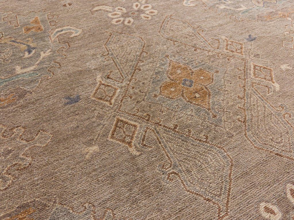 8x10 Roya Rugs Pineville North Carolina modern muted oushak wool rug with neutral greige, grey, beige, apricot orange, light aqua blue and brown colors with vintage design carpet.