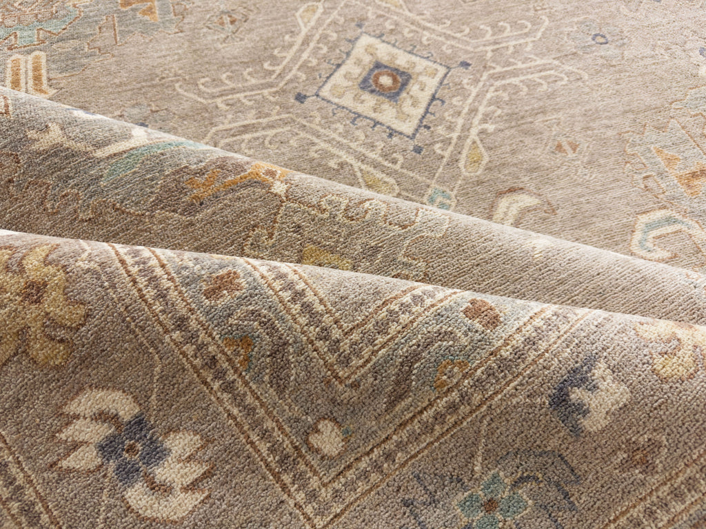 8x10 Roya Rugs Pineville North Carolina modern muted oushak wool rug with neutral greige, grey, beige, apricot orange, light aqua blue and brown colors with vintage design carpet.