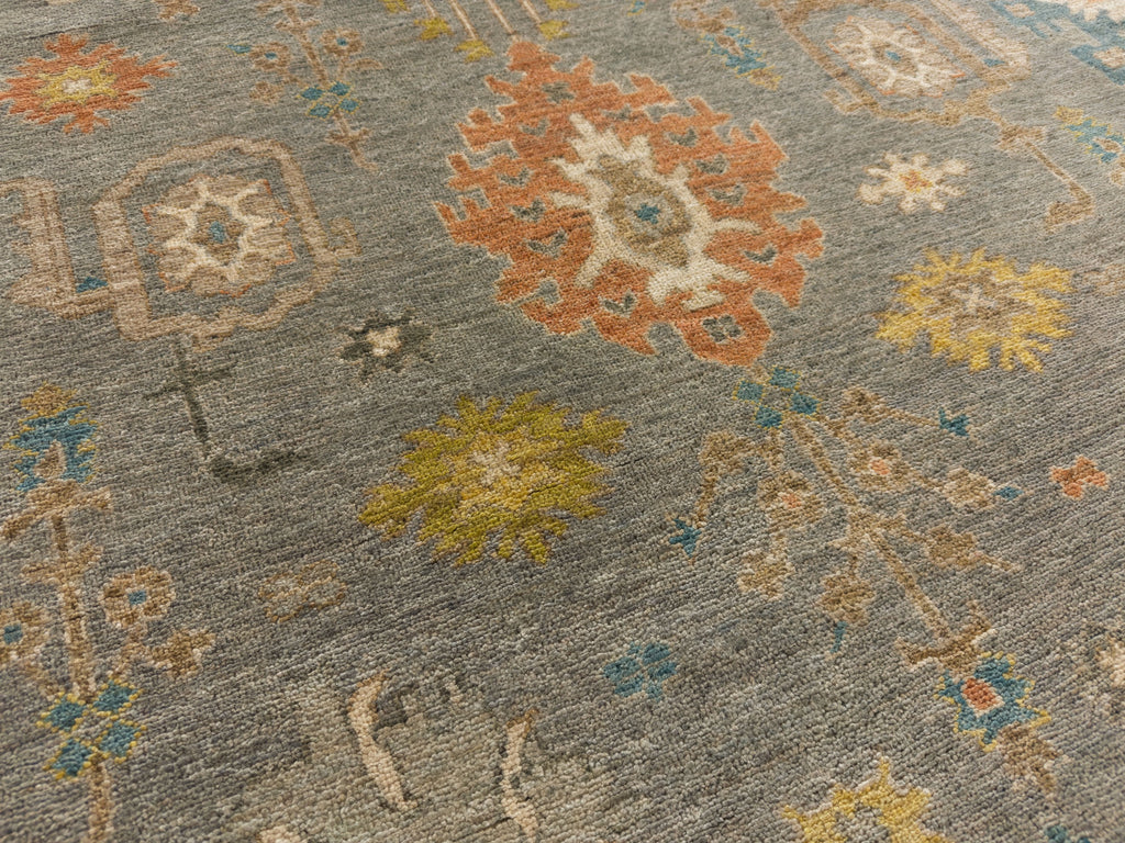 Roya Rugs North Carolina hand knotted one of a kind colorful modern Persian oriental wool rug 9 x 12 with blue grey, citron yellow, citrus, blue, brown, and orange accent colors and floral traditional design with low pile texture and lanolin natural fiber.