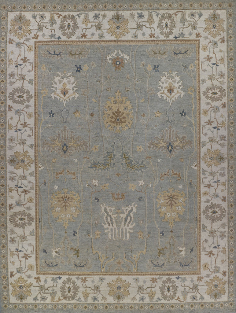 Light green gray with ivory brown blue colored 10x14 turkish oushak wool rug.