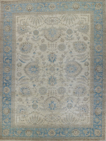 10x14 hand knotted oushak wool rug with ivory background and sky, light blue border.
