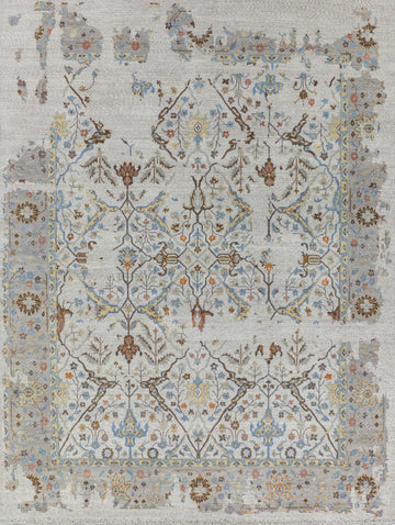 Roya Rugs Elke EL-02 colorful hand knotted modern distressed oriental turkish oushak wool rug with ivory, grey, orange, brown, beige/yellow, and light blue colors. Available in rug sizes 4x6, 8x10, 9x12, 10x14, 12x15 and large oversized 12x18.
