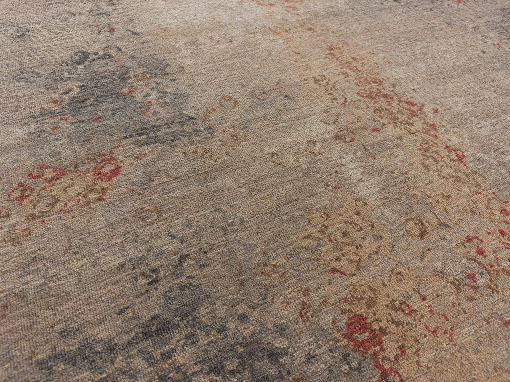 Coral vermilion red, nude, grey, charcoal and beige zero pile wool rug.
