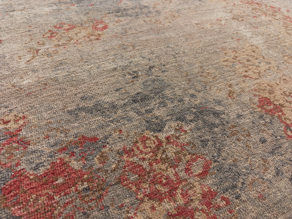 Coral vermilion red, nude, grey, charcoal and beige zero pile wool rug.