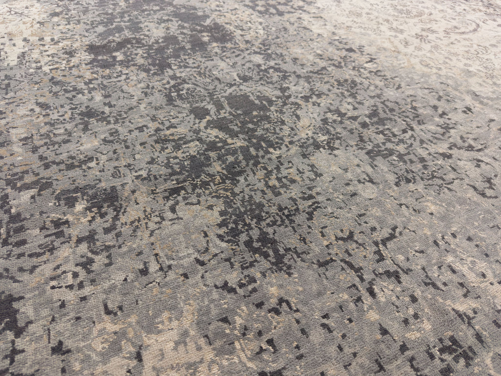 Transitional distressed wool and silk rug with dark grey, beige, indigo blue, and champagne brass colors