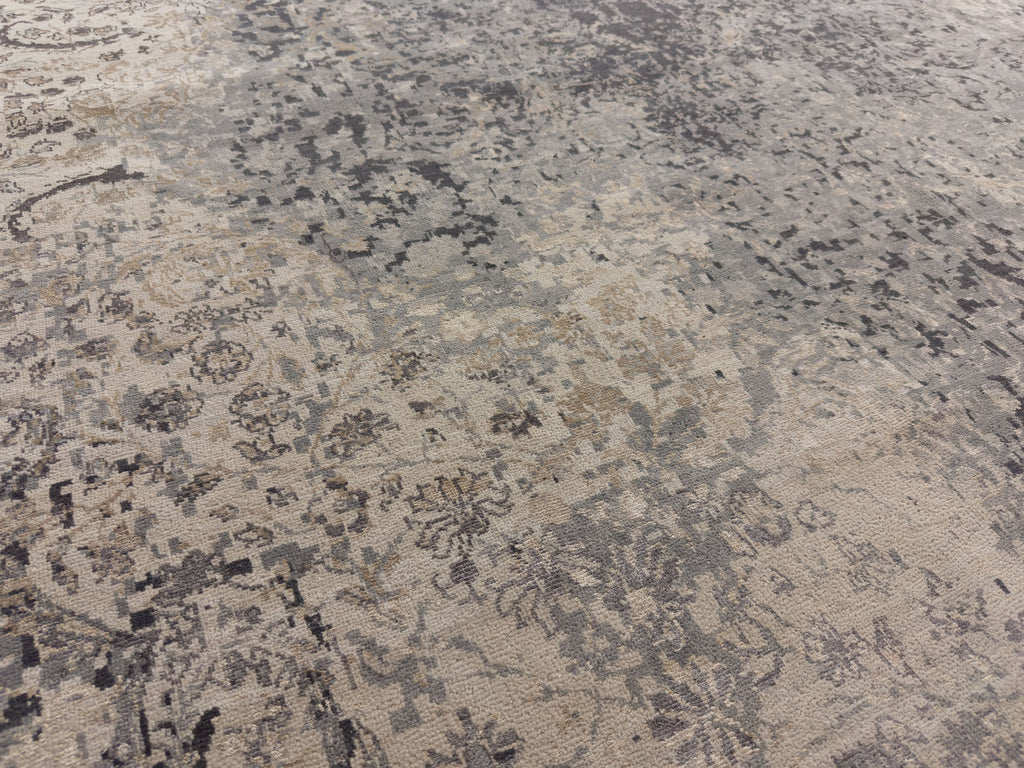 Transitional distressed wool and silk rug with dark grey, beige, indigo blue, and champagne brass colors