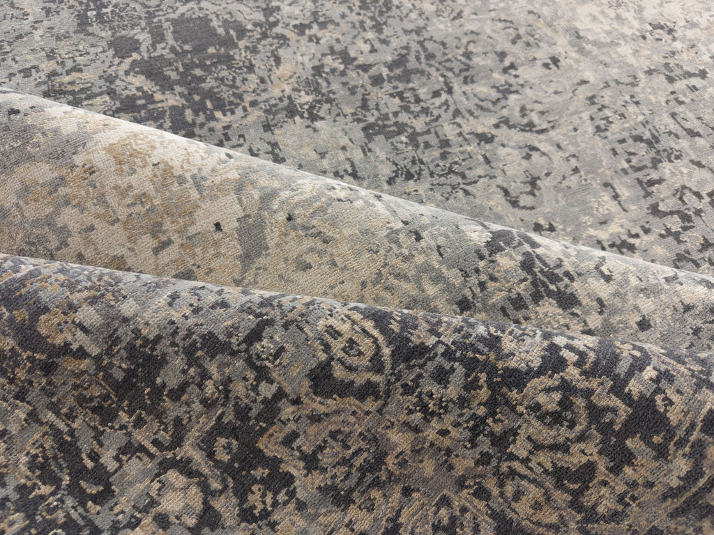 Transitional distressed wool and silk rug with dark grey, beige, indigo blue, and champagne brass colors