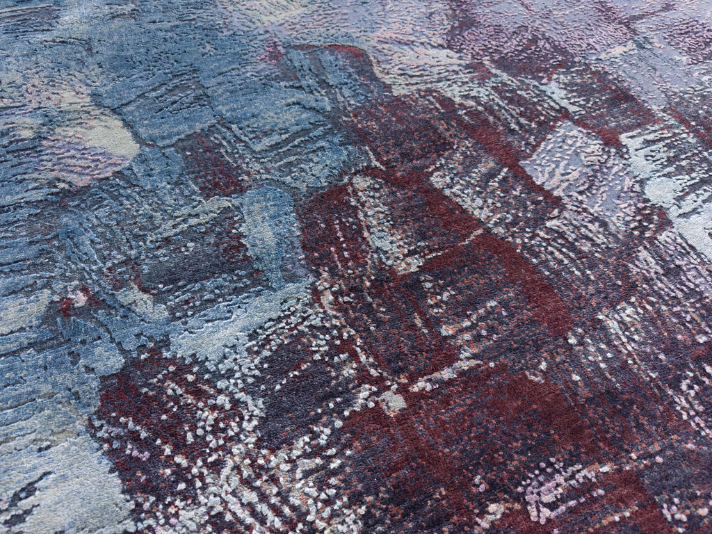 Wool and silk dark wine red, blue and sunset pink rug.