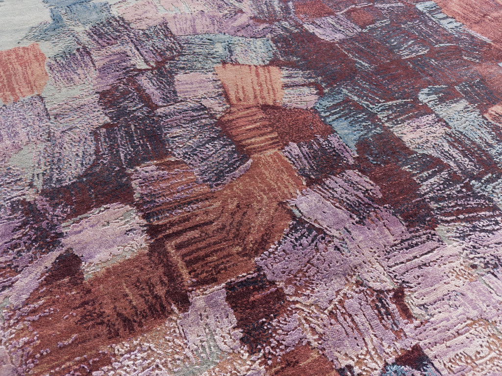 Wool and silk lavender, lilac pink, clay, dark red and blue rug.