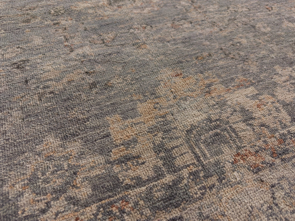 Rustic slate blue, brick and nude oriental rug.
