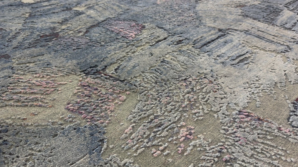 Colorful modern rug with silk texture and sunset colors.